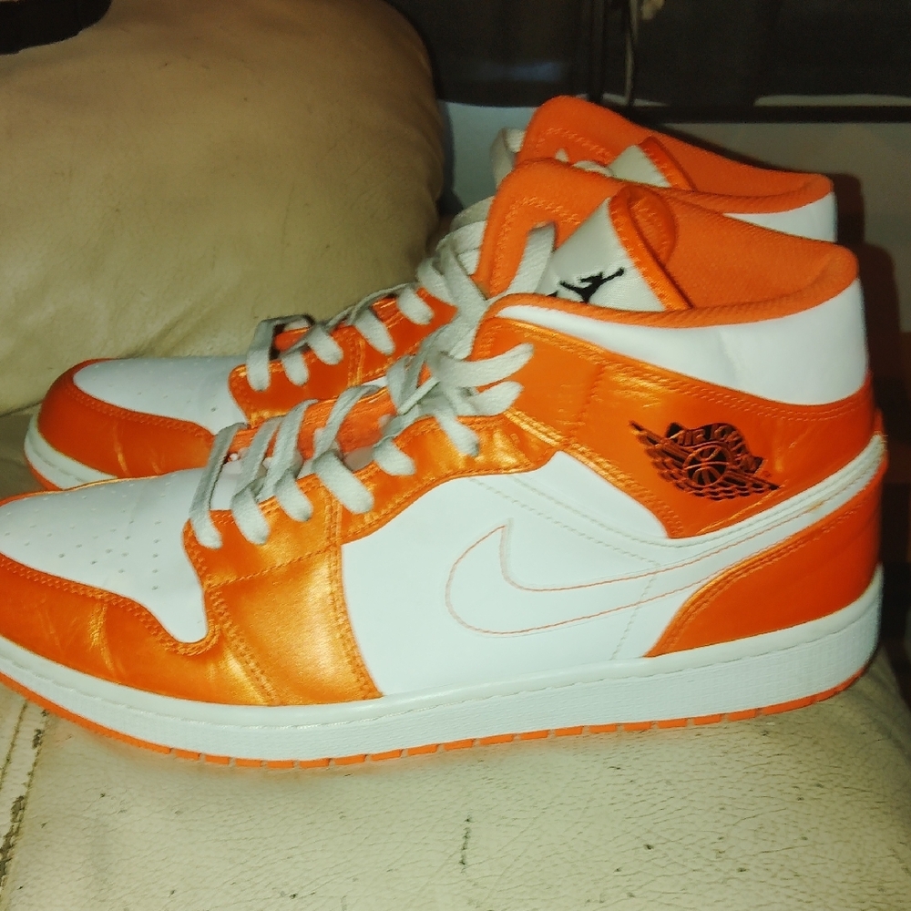Orange and White High-Top Jordan Sneakers